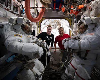 https://scitechdaily.com/images/Team-Portrait-During-Spacewalk-Preparations-2048x1365.jpg