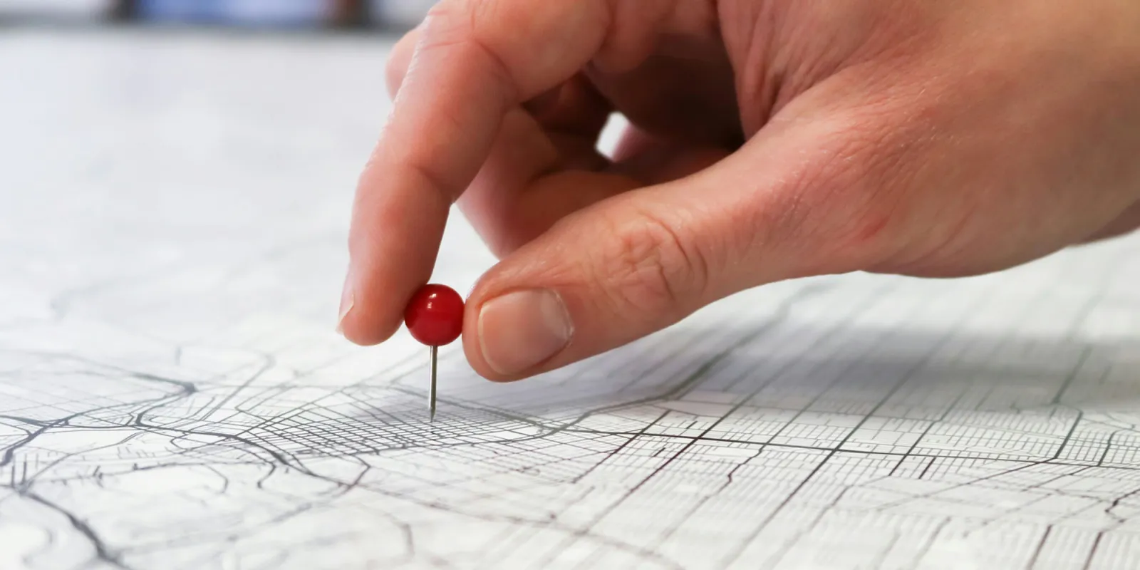 Apple Location Services vulnerability | Hand placing pin on map