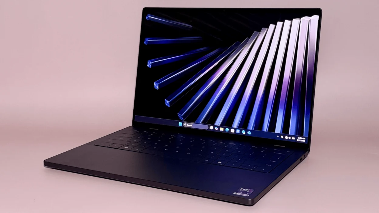 the dell xps 14 against a pink background