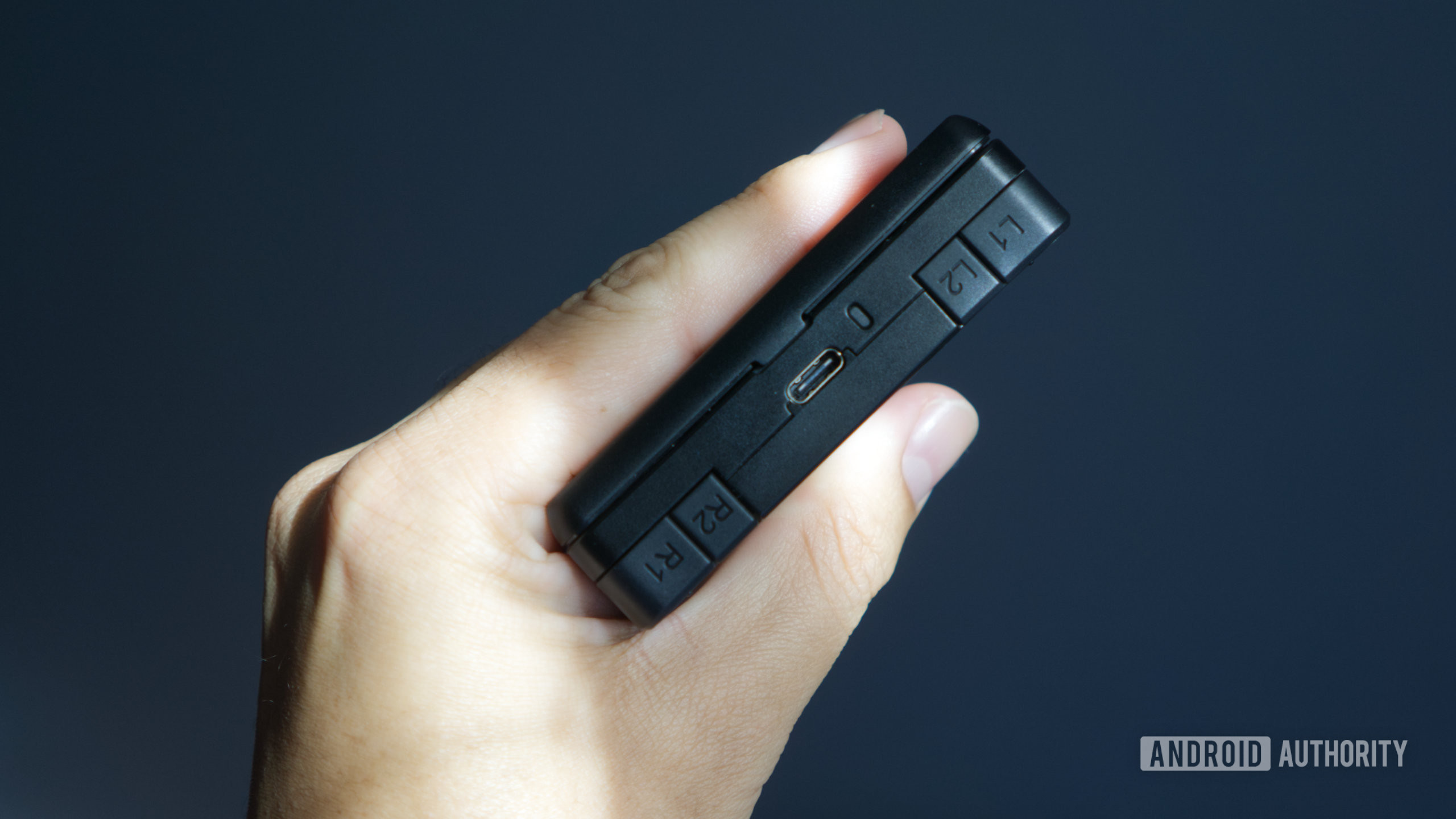 ANBERNIC RG Rotate showing triggers and USB port