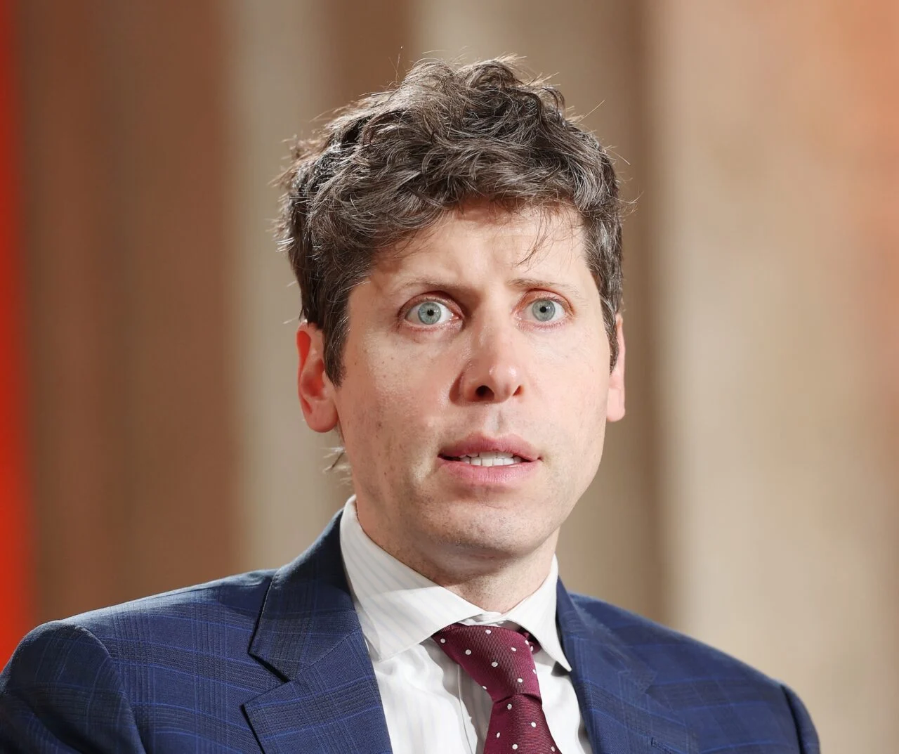 OpenAI CEO Sam Altman in a suit