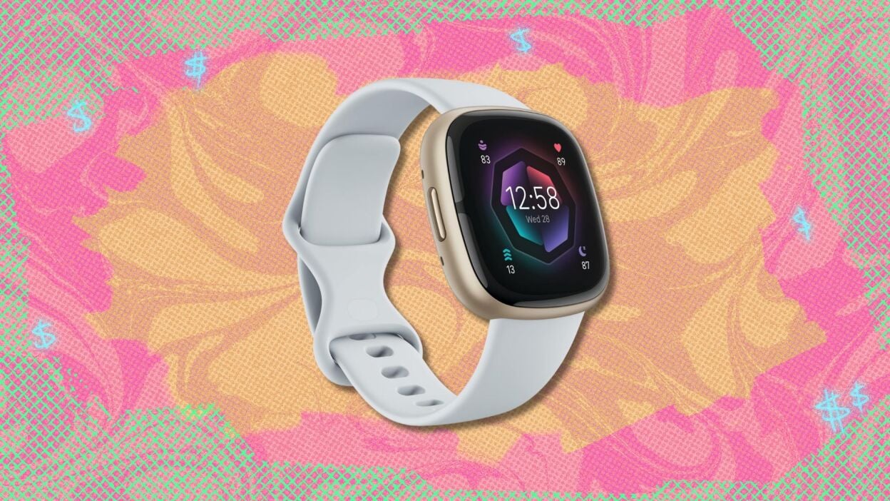fitbit sense 2 against a yellow, pink, and green patterned background