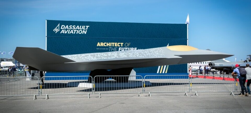 Full-scale NGF combat aircraft mock-up on display outside with Dassault Aviation branding.