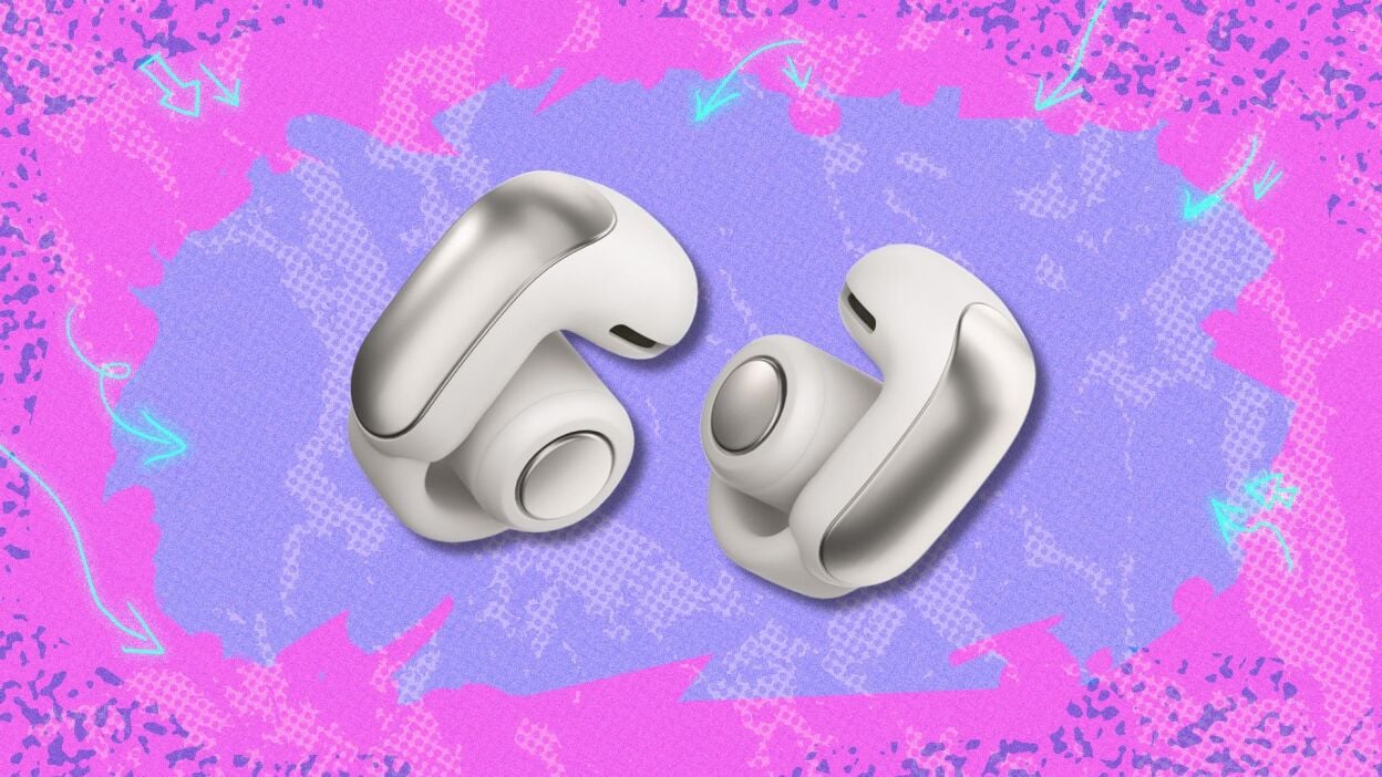 bose ultra open earbuds against a pink and purple patterned background
