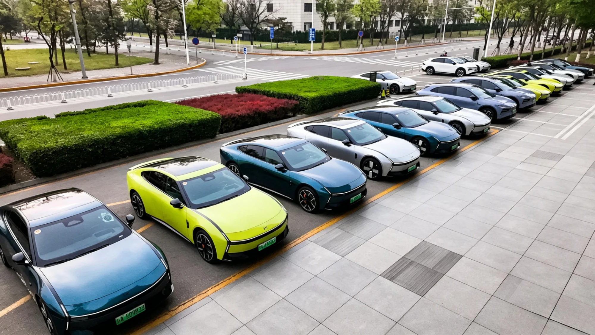 Several XPENG cars lined up parked in a hotel parking lot in Beijing.