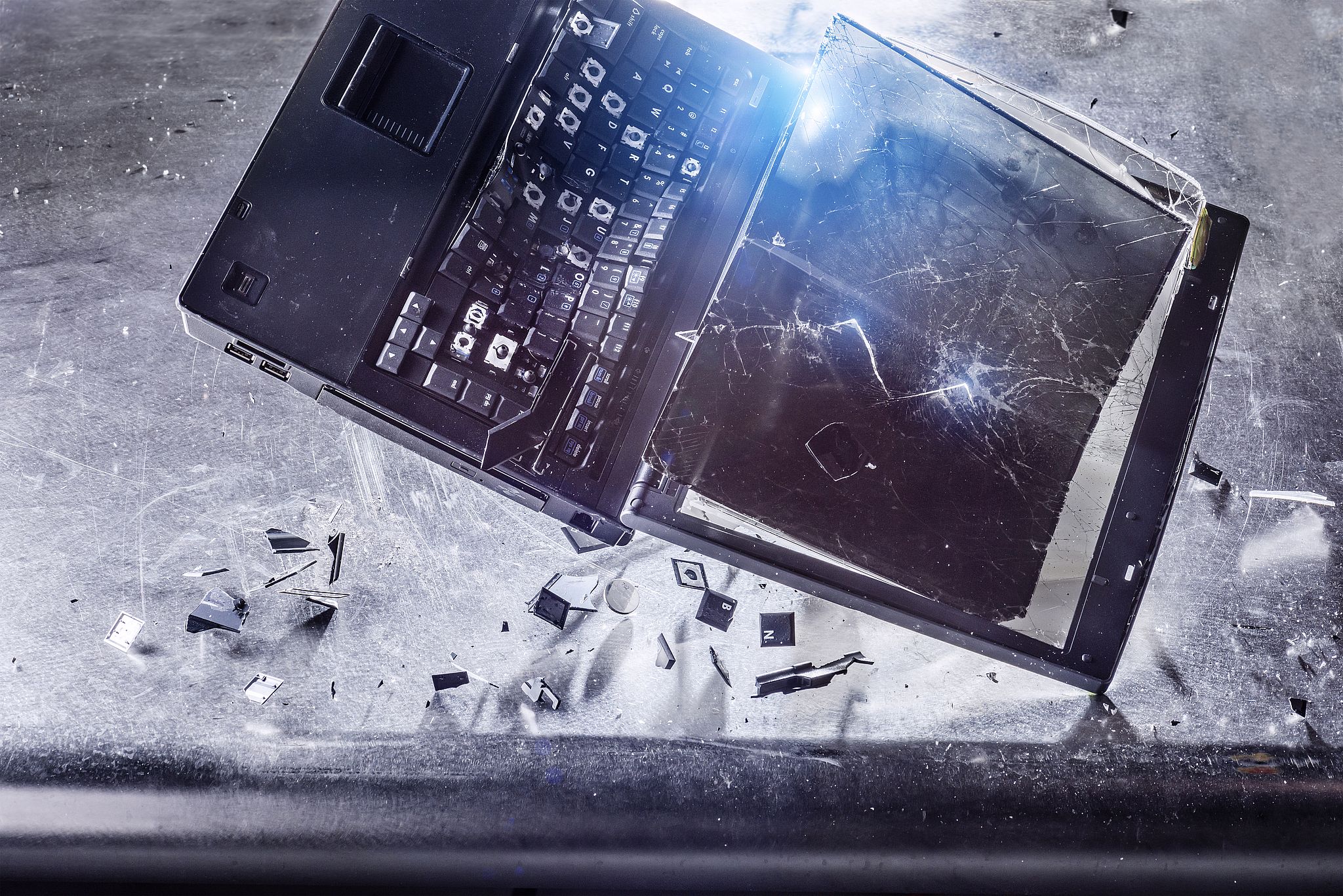 Falling laptop cracking