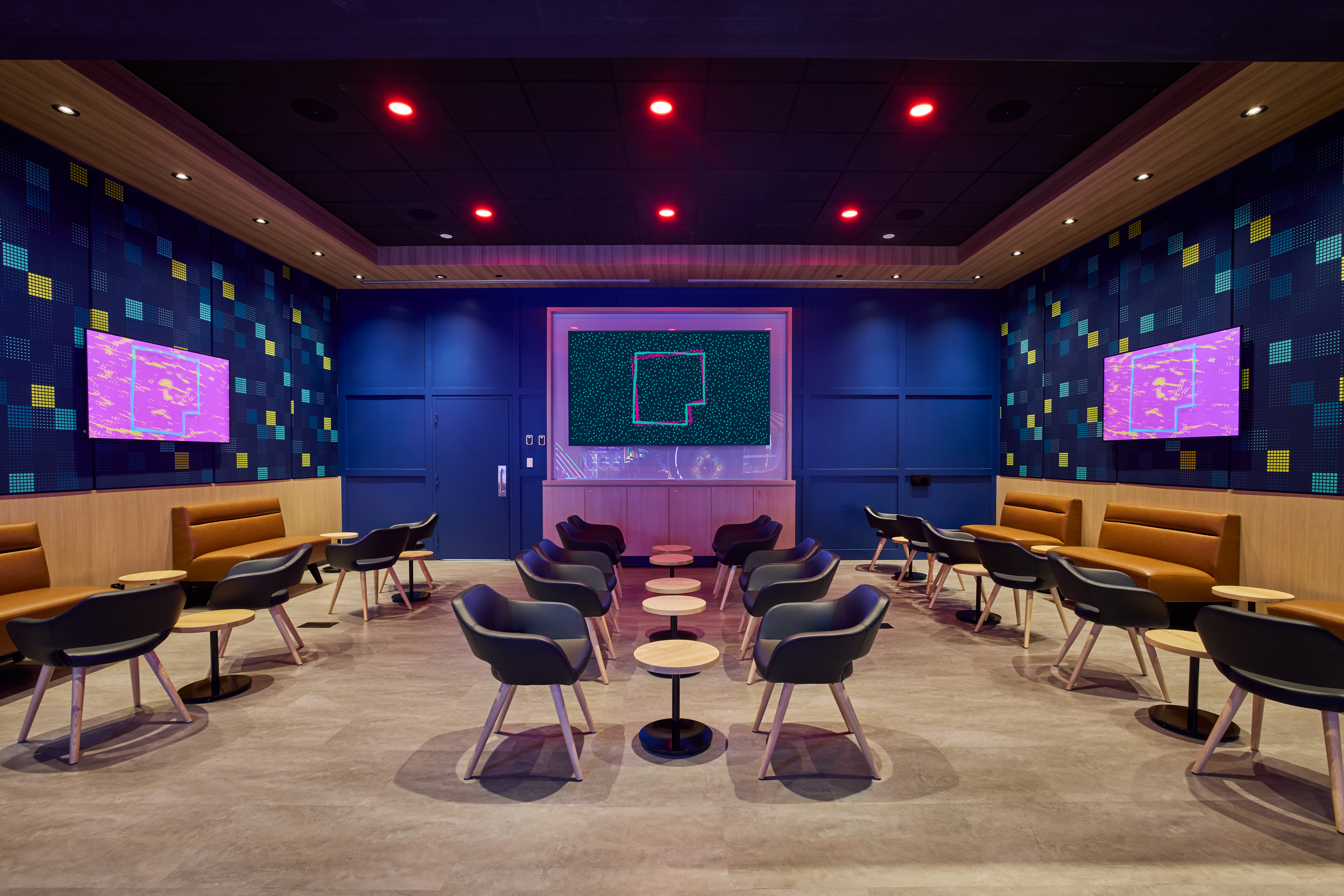 Playdium Vaughan has an elevated lounge space where guests can relax and enjoy their meals.
