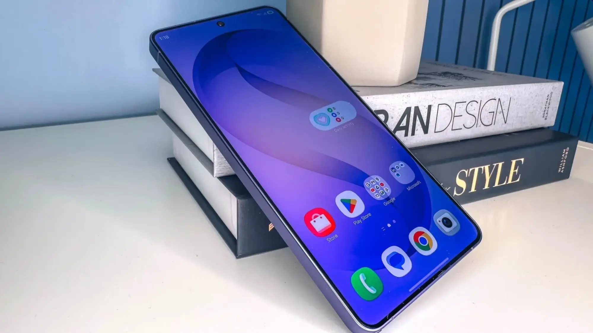 Samsung Galaxy S26 Ultra resting on some books