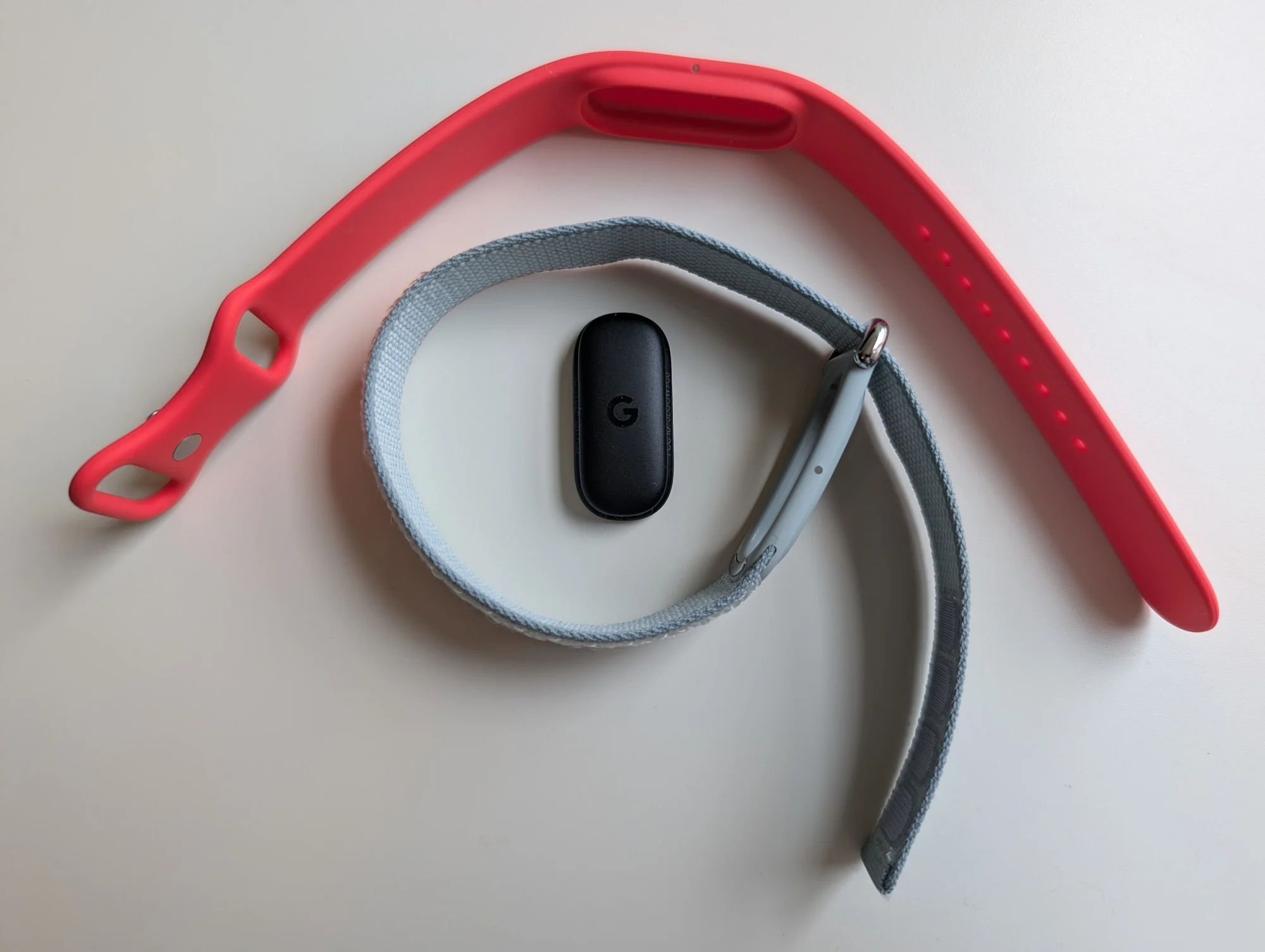 the google fitbit air with two bands and the fitness tracker itself