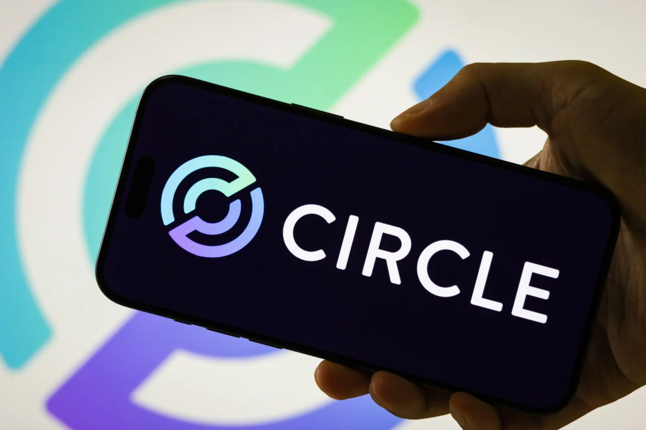 Circle Logo Displayed On Smartphone Screen