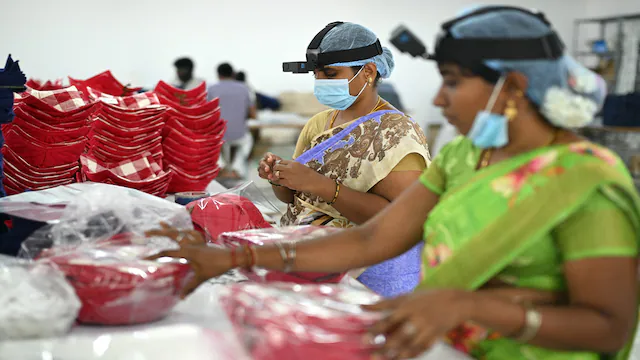 The Indian workers training AI robots to take their jobs