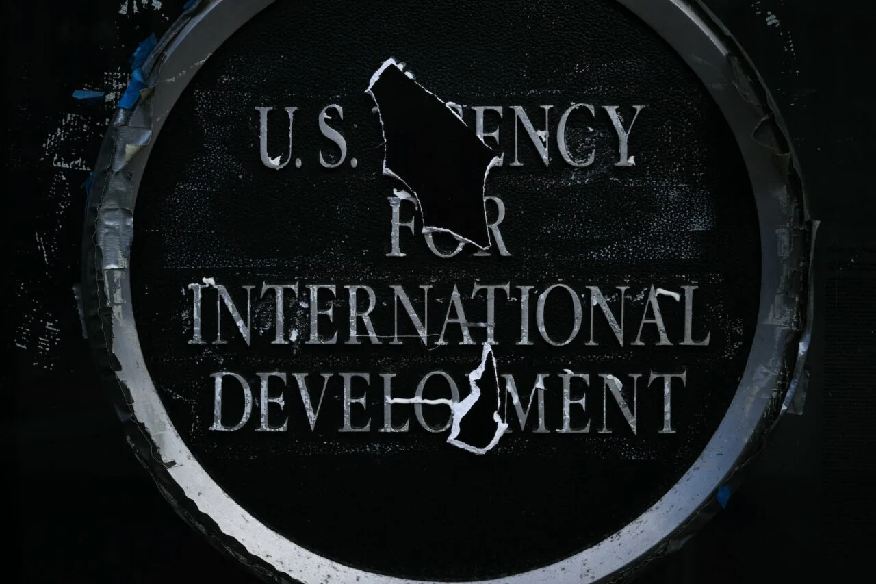 Remnants of signage for the US Agency for International Development (USAID) on the facade of the Ronald Reagan Building and International Trade Center building in Washington, DC, on December 29, 2025.