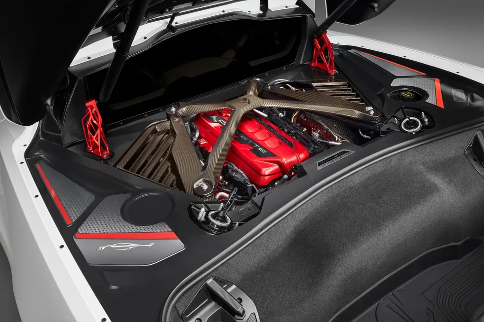 Photo of a sports car under the rear hatch. 