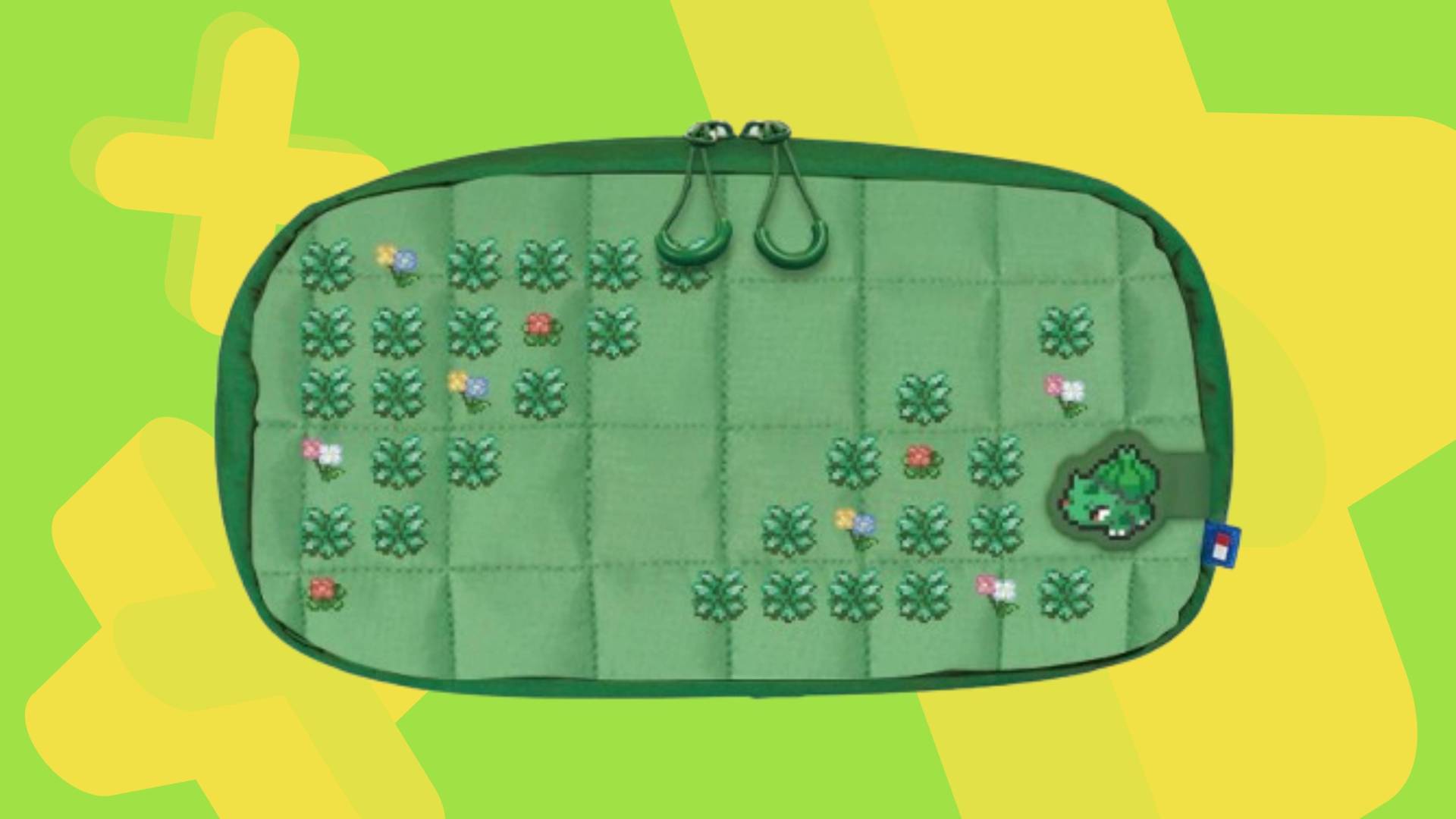 Image of the Hori Pokemon Pixel Green Puff Pouch on a green GamesRadar+ background.