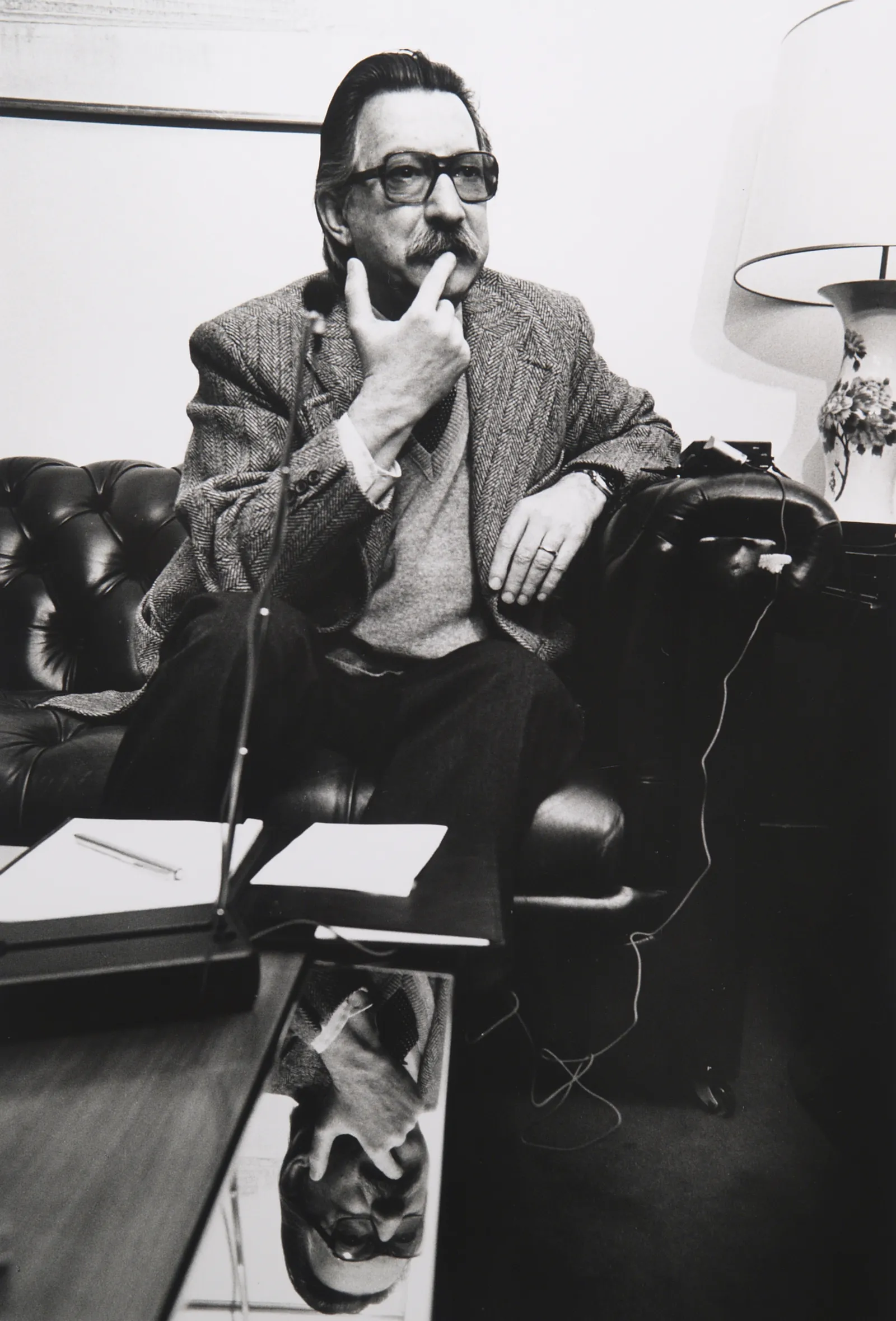 Image may contain Joseph Weizenbaum Adult Person Sitting Head Face Photography Portrait Accessories and Glasses