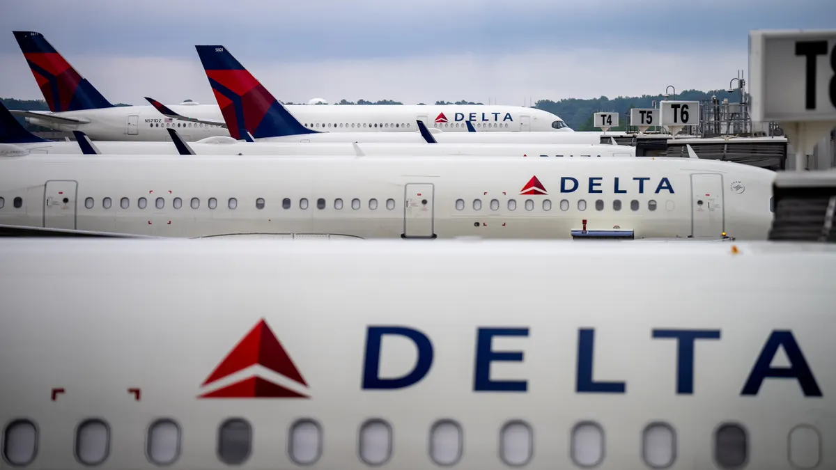 Delta Airlines planes sit parked at Hartsfield-Jackson Atlanta International Airport on June 28, 2024 in Atlanta, Georgia.
