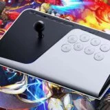 A fight stick appears overtop of art for Marvel.