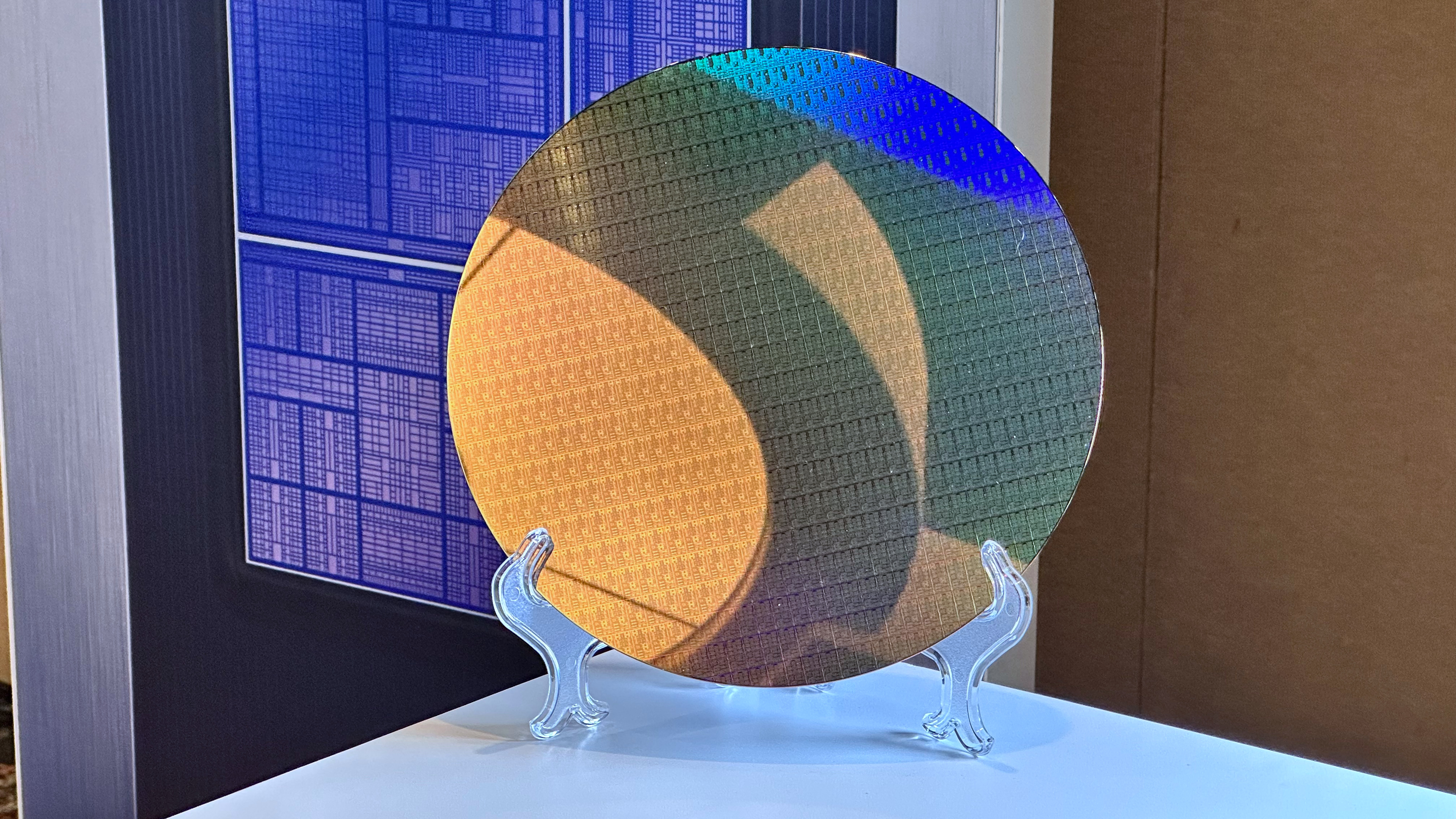 The company that makes all the West's chipmaking machines says it's selling more than it expected thanks to 'very strong momentum in both DRAM and advanced logic'