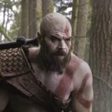 Kratos stares in the woods.