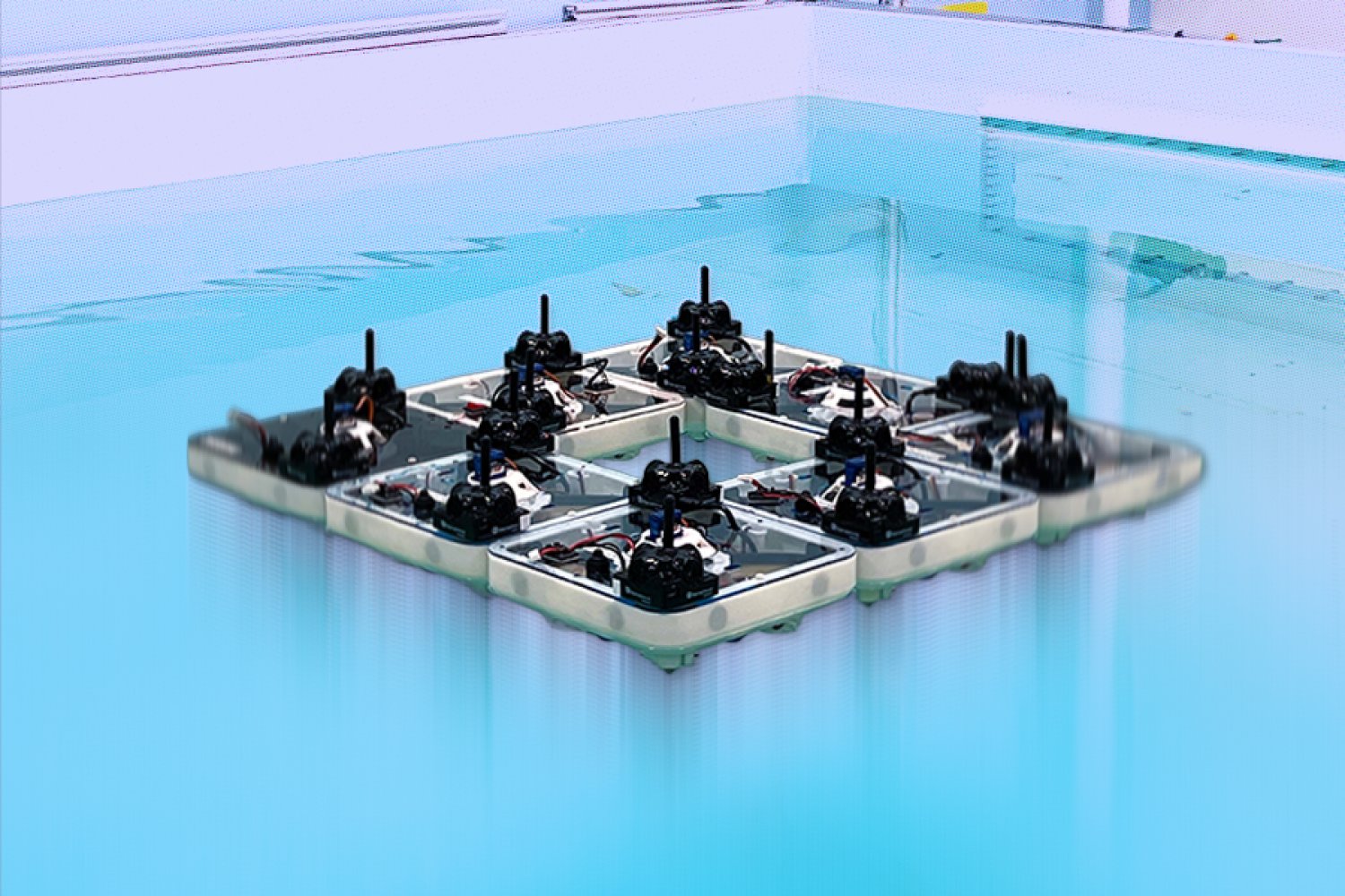 Tiny robot boats build floating structures